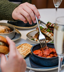 People sharing small plates
