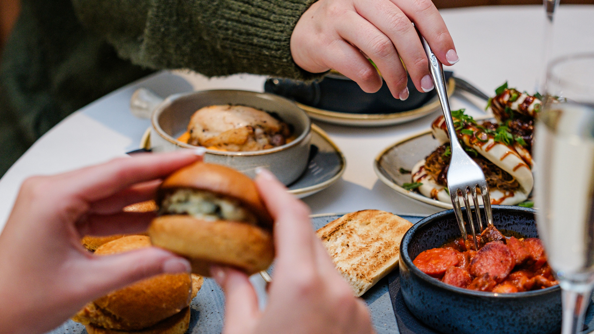 People sharing small plates