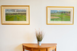 Paintings in hallway in Kingennie Court North Lodge