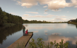 People fishing in fishing pond