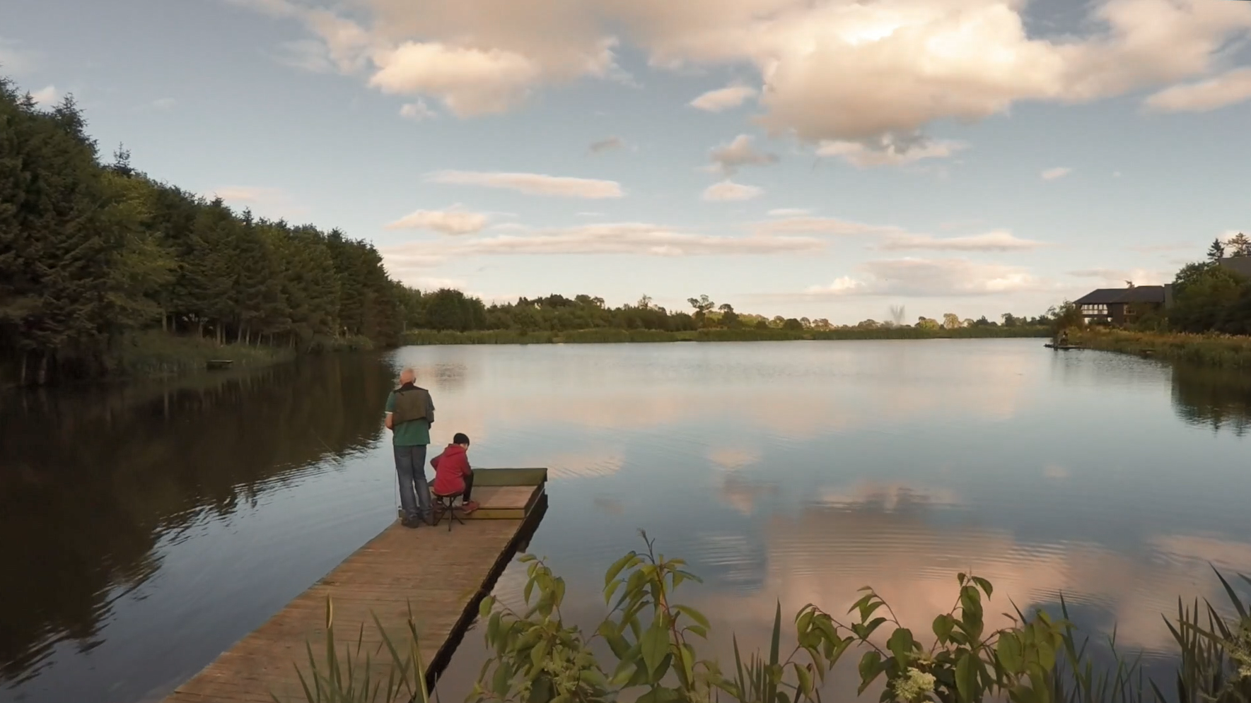 People fishing in fishing pond
