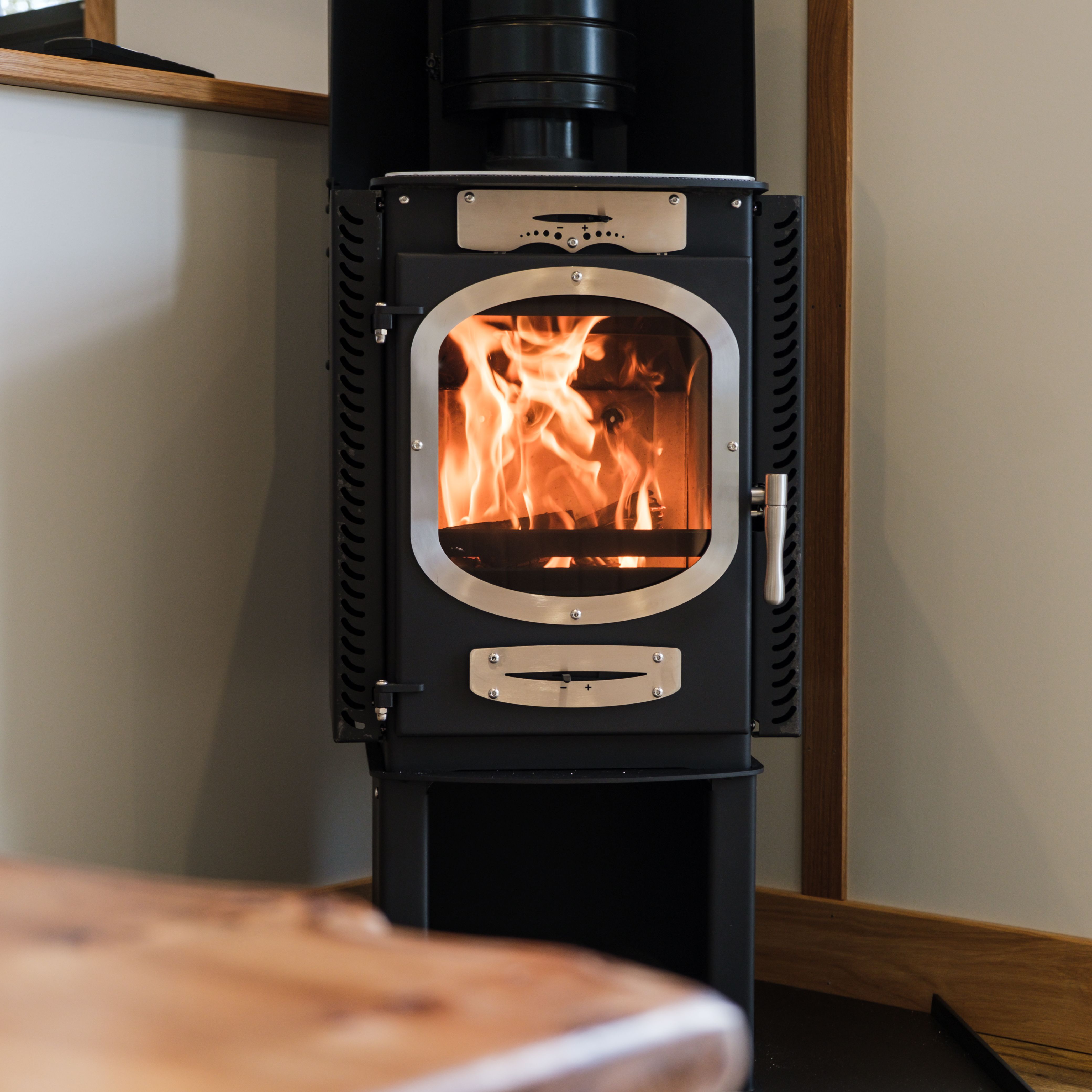 A crackling log burner in one of the Escape Pods