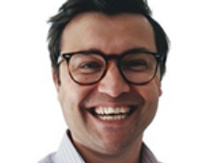 Smiling man wearing glasses