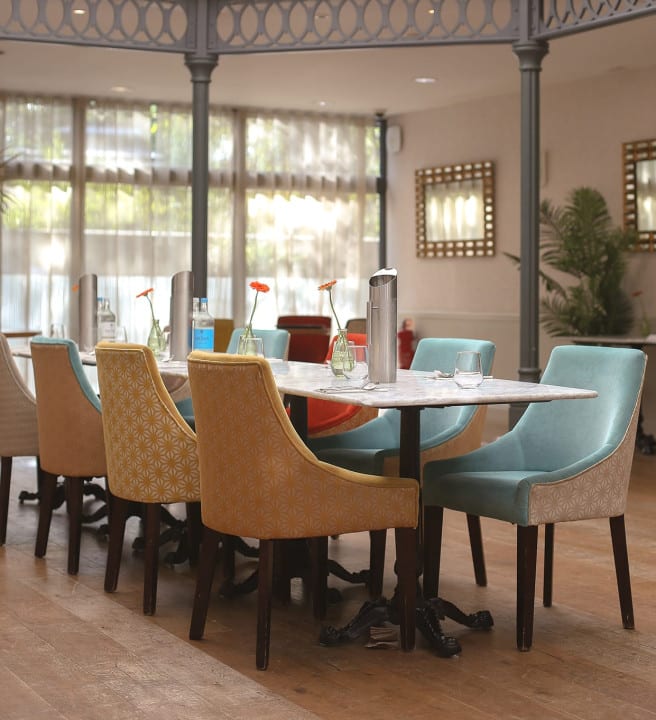 Dining table set up in centre of room