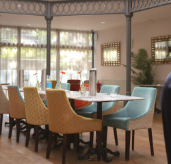 Dining table set up in centre of room