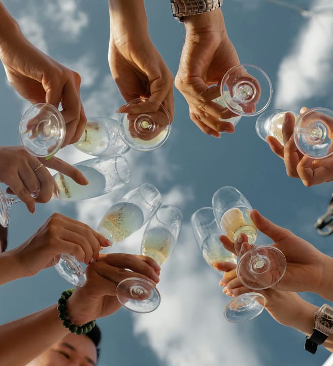 People raising glasses of champagne