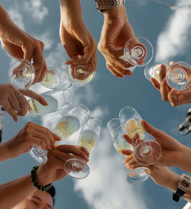 People raising glasses of champagne
