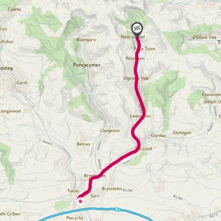 Image showing a scenic landscape with colorful mountains and a winding river.