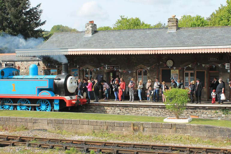 Thomas the tank engine steam train at a train station
