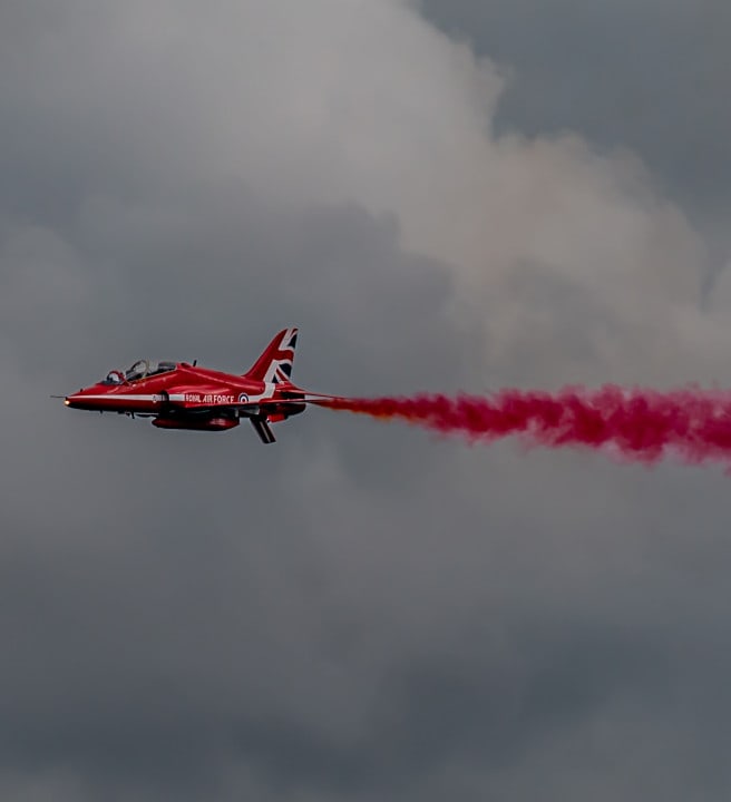 Red arrow plane in the sky