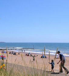 Father and son at Dawlish Warren beach