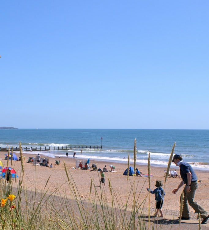 Father and son at Dawlish Warren beach