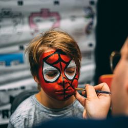 Child with Spiderman face paint