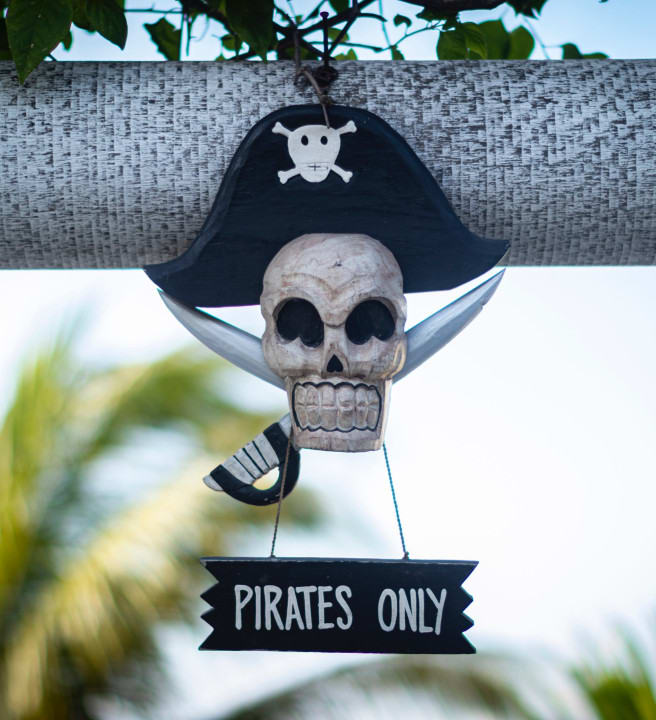 A pirate hanging sign