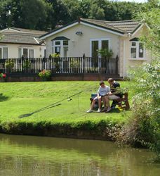 Father and son fishing at Hazelwood Holiday Park