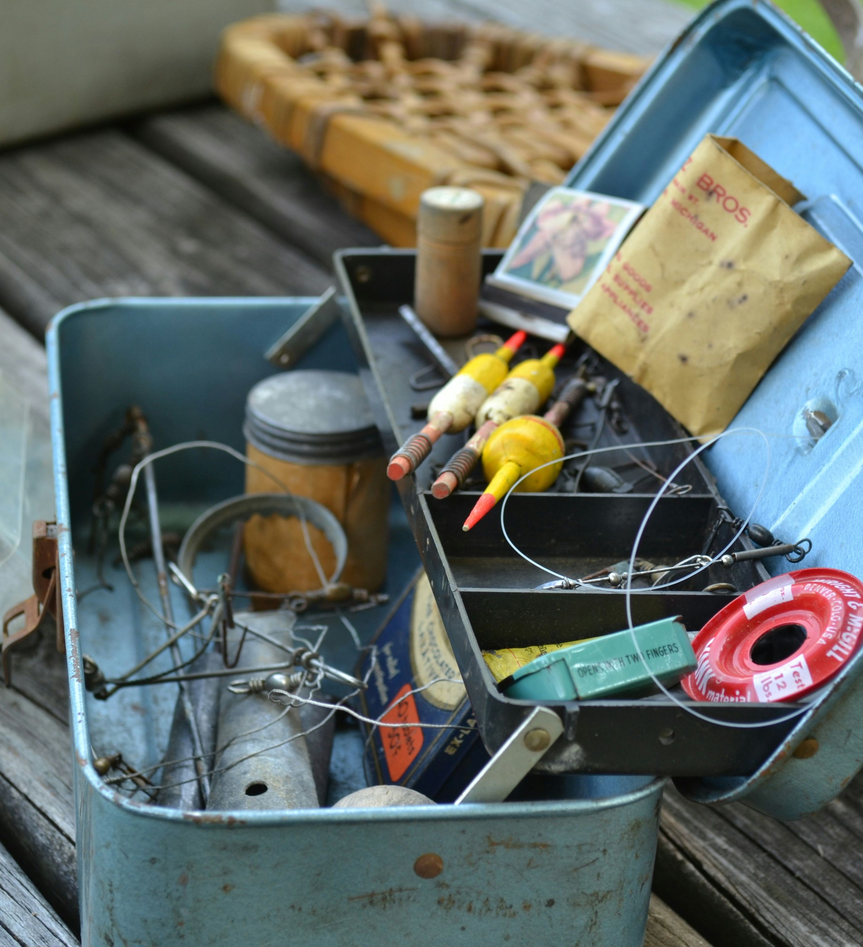 Old box full of fishing tackle and bait