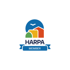 HARPA member badge with building shapes and a bird in the logo