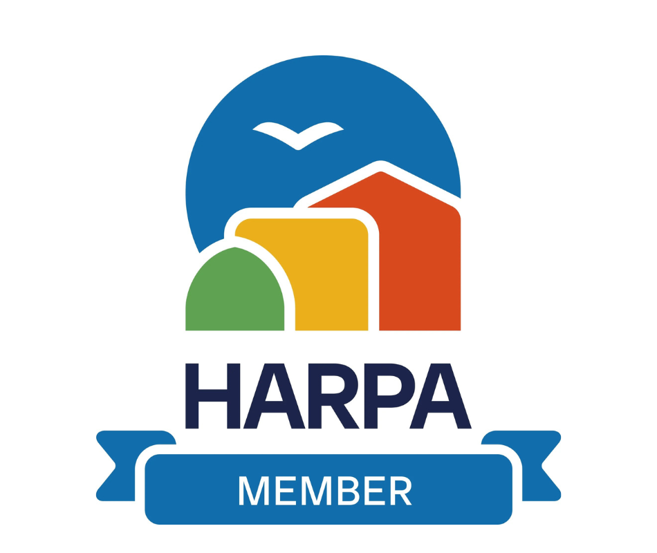HARPA Member logo with stylised buildings and a bird in a blue circle