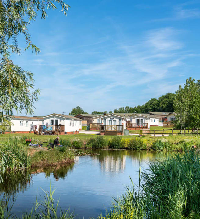 Holiday Homes around a lake, Hazelwood Holiday Park