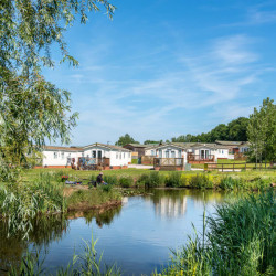 Holiday Homes around a lake, Hazelwood Holiday Park