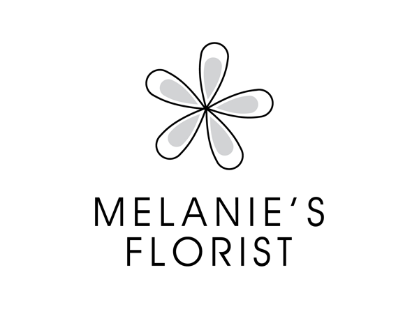 Melanie’s Florist logo with a stylised five-petal flower above the text