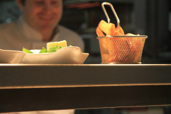 Chef serving food