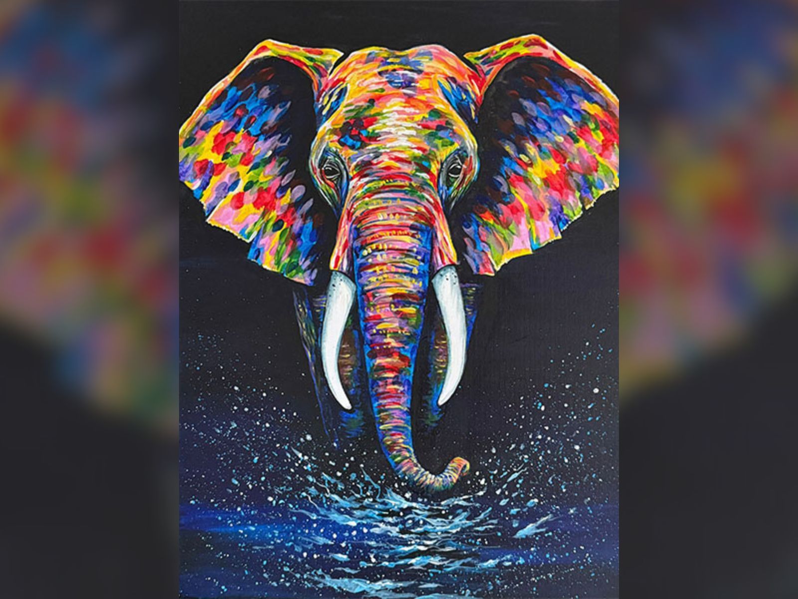 Colorful painting of an African elephant with splashes of paint and water