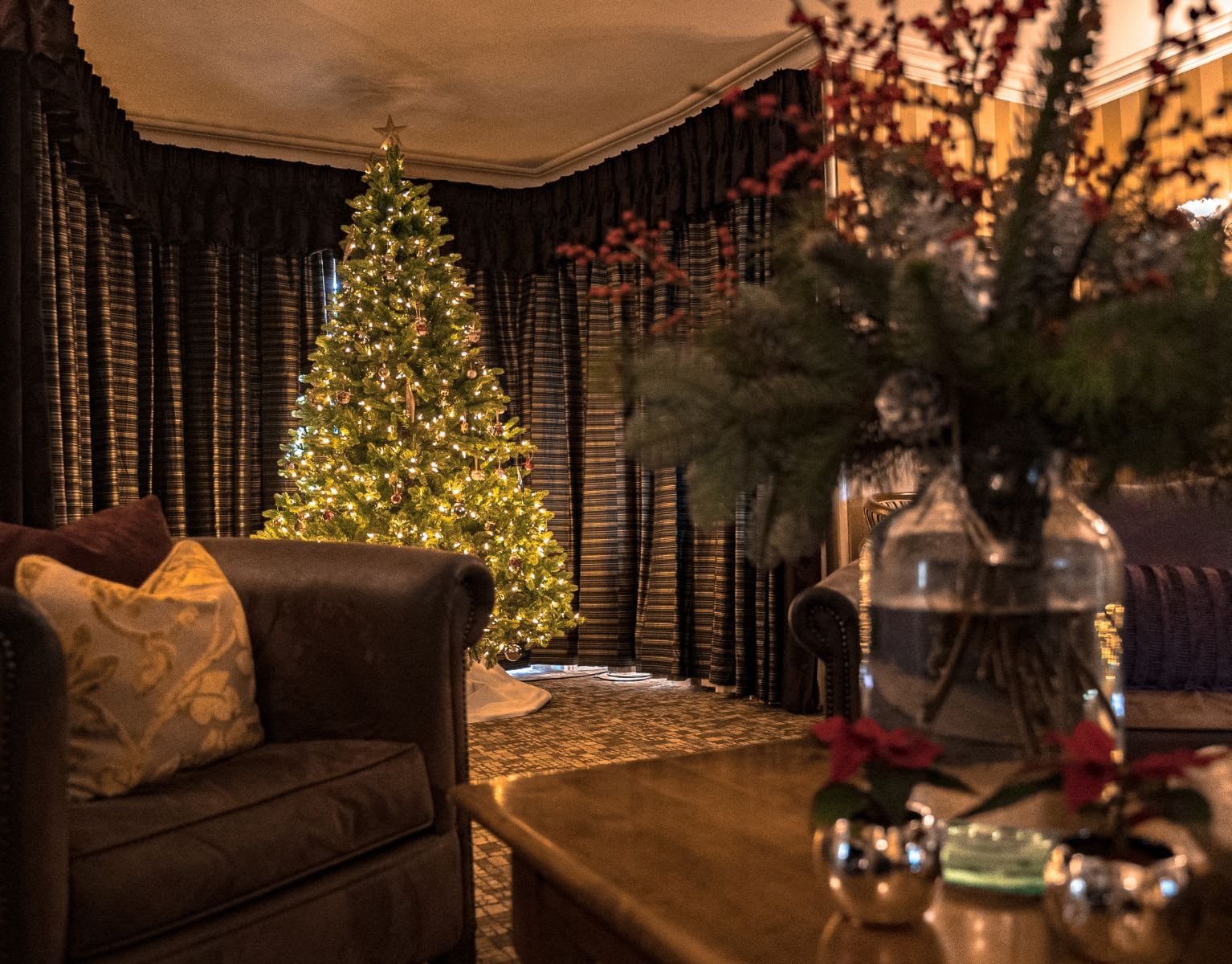 Cosy drawing room decorated for Christmas
