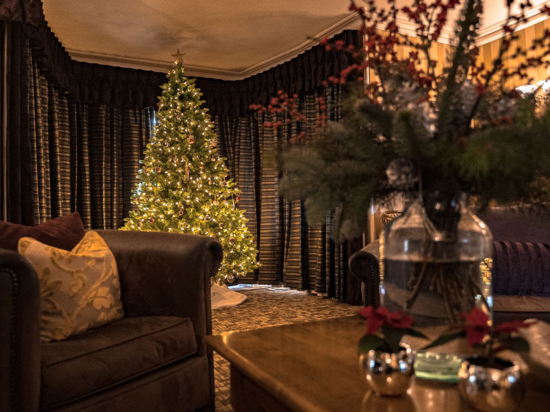 Cosy drawing room decorated for Christmas