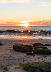 Old Hunstanton Beach with the sunsetting into the sea
