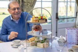 Gentleman Eating Afternoon Tea