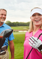 Mixed Pairs Playing Golf
