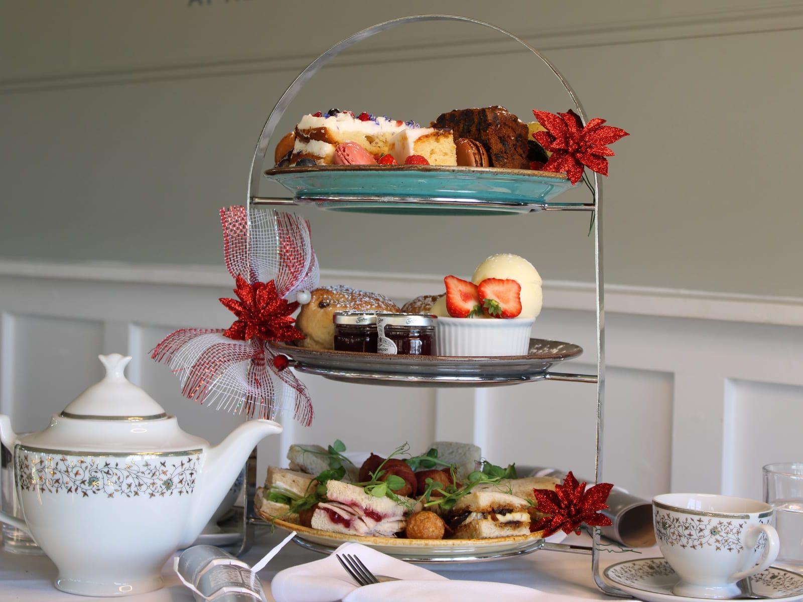 Festive afternoon tea on table with full set up and festive decorations