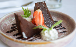 No. 82 Chocolate Brownie with Cream and Strawberry Garnish