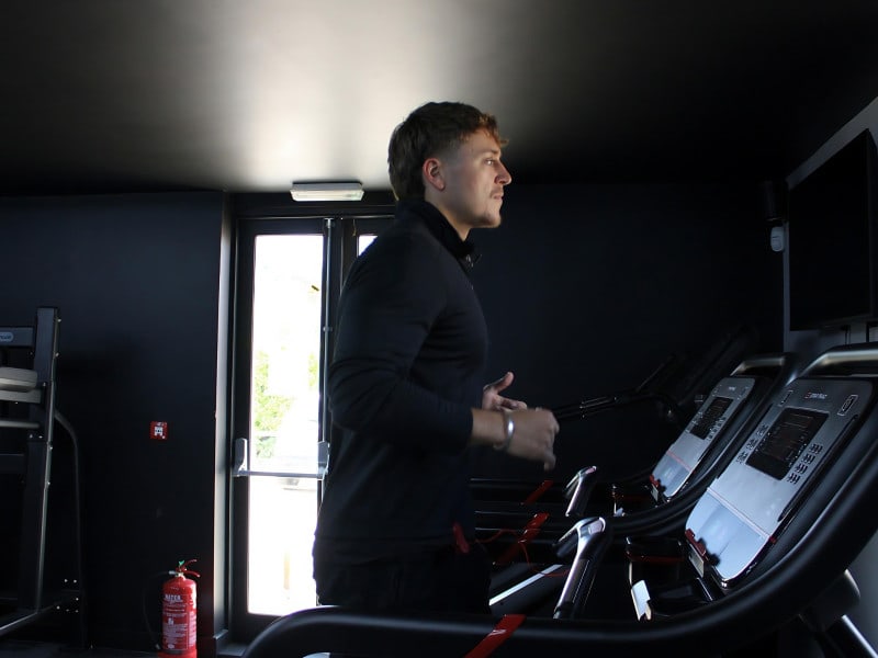 Man running on treadmill in The Wellness Centre
