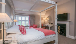 manor-four-poster-fireplace-view