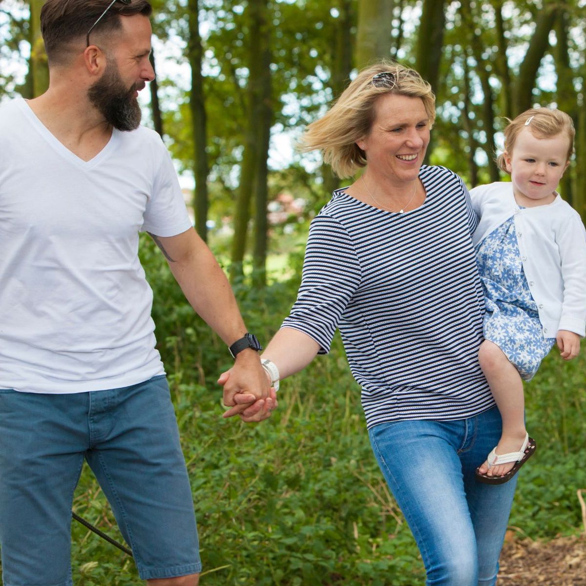 Family Walking in Woods at Heacham Manor