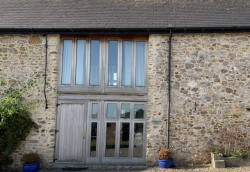 The outside of The Milking Parlour Barn.