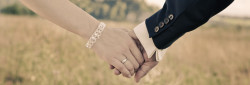 Two people holding hands.