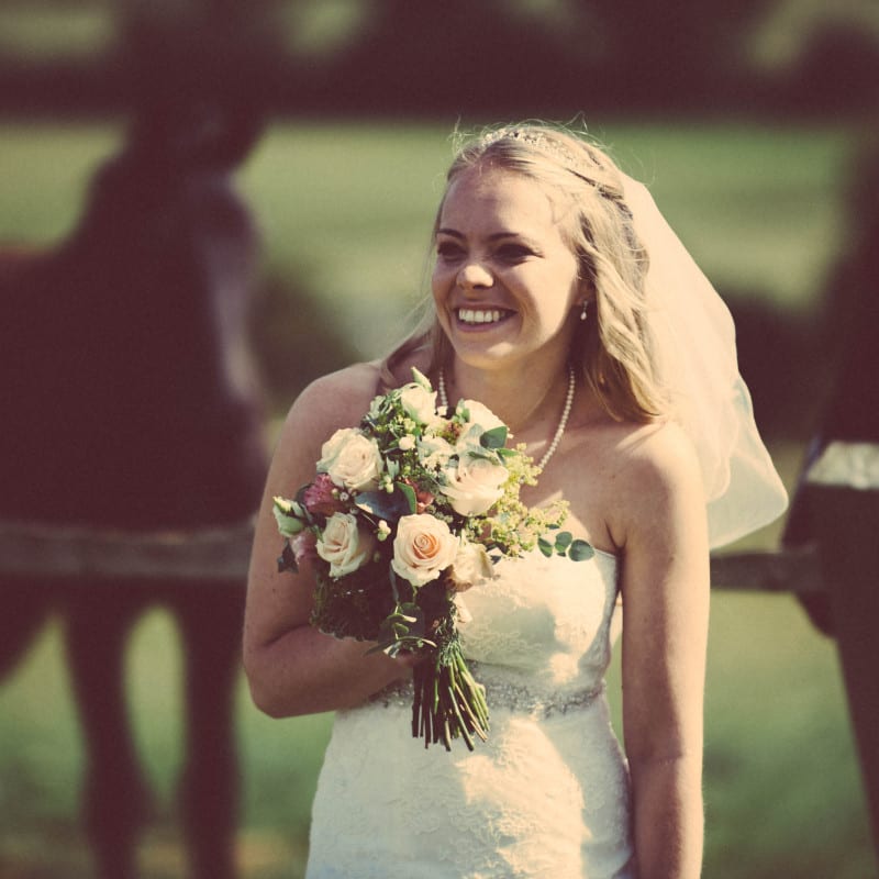Bride posing in the countryide.