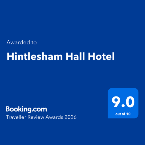 Booking.com Traveller Review Awards 2026 graphic awarded to Hintlesham Hall Hotel with a 9.0 out of 10 rating on a blue background.