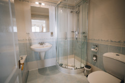 Suite bathroom with shower and bath