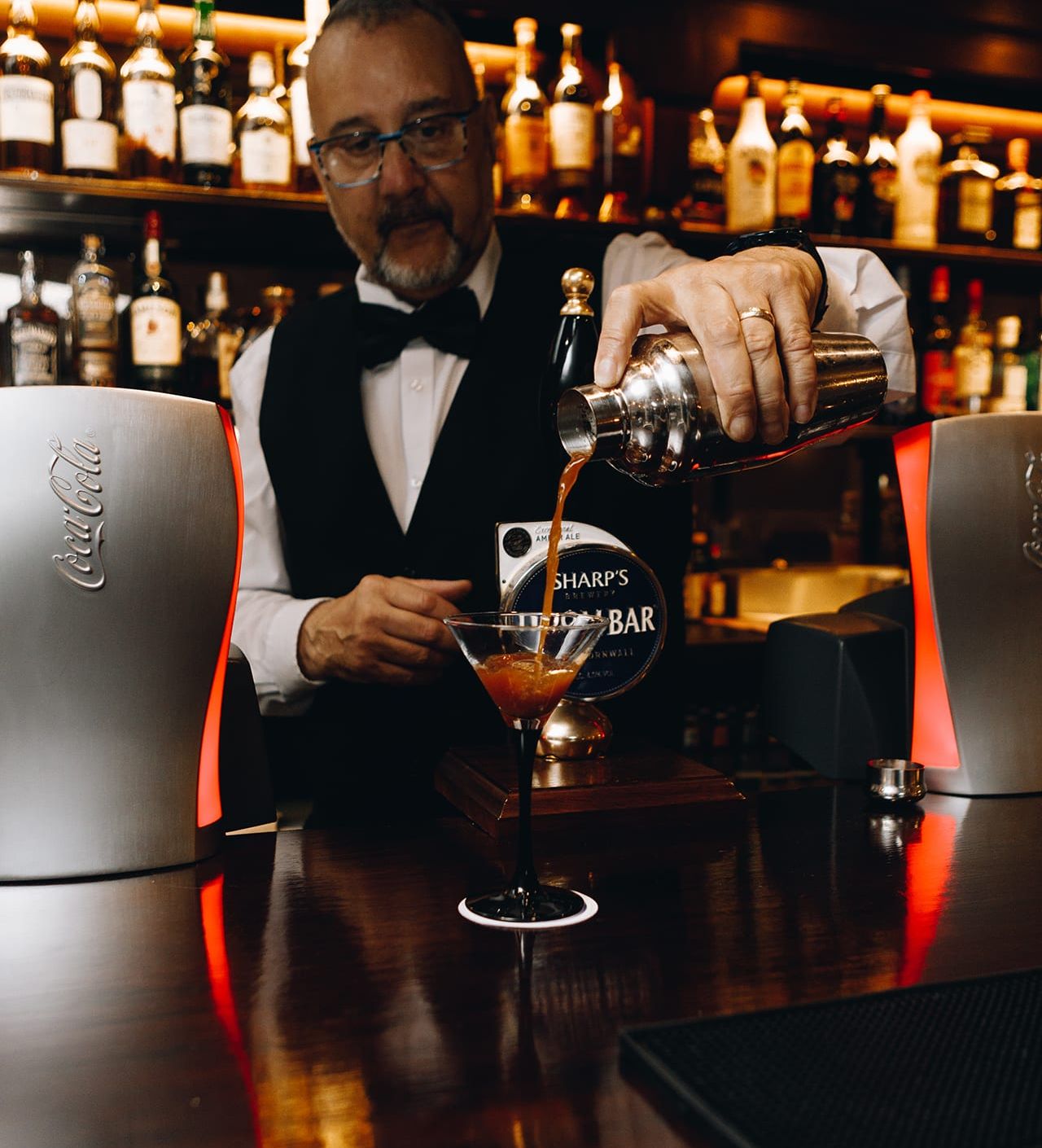 Barman making cocktail