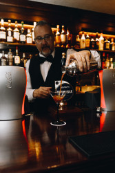 Barman making cocktail