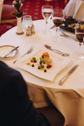 Guests eating dinner