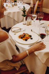 Guests eating dinner