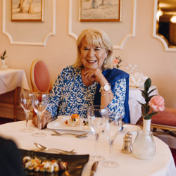 Guest eating dinner in dining room