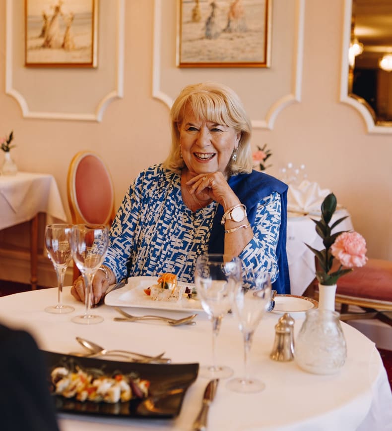 Guest eating dinner in dining room