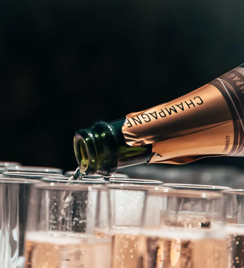 Champagne pouring into glasses
