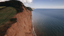 Aerial view of sea and cliffs